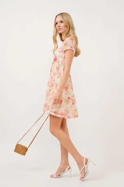 Trendsi floral fishnet dress with square neckline and tiered design, featuring a vibrant floral pattern and layered skirt.