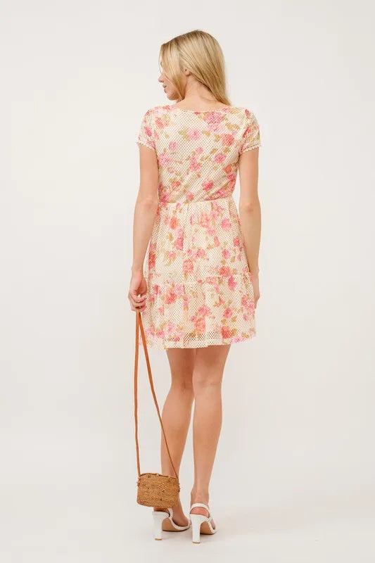 Trendsi floral fishnet dress with square neckline and tiered design, featuring a stylish floral pattern and layered skirt.