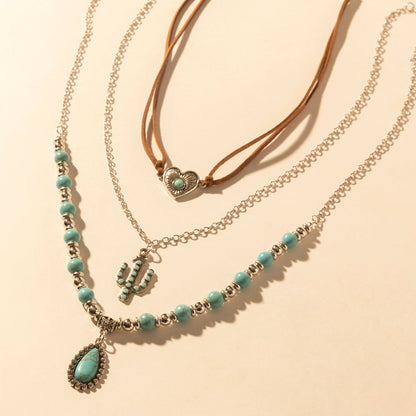 Myra USA boho layered necklace for women with turquoise beads and cactus pendant, perfect for western wear styling.