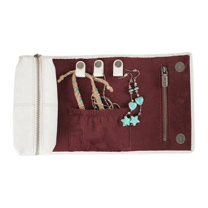 Small ivory dust leather jewelry case by Myra USA with hand-tooled canyon design, compact storage for necklaces, rings, and earrings.