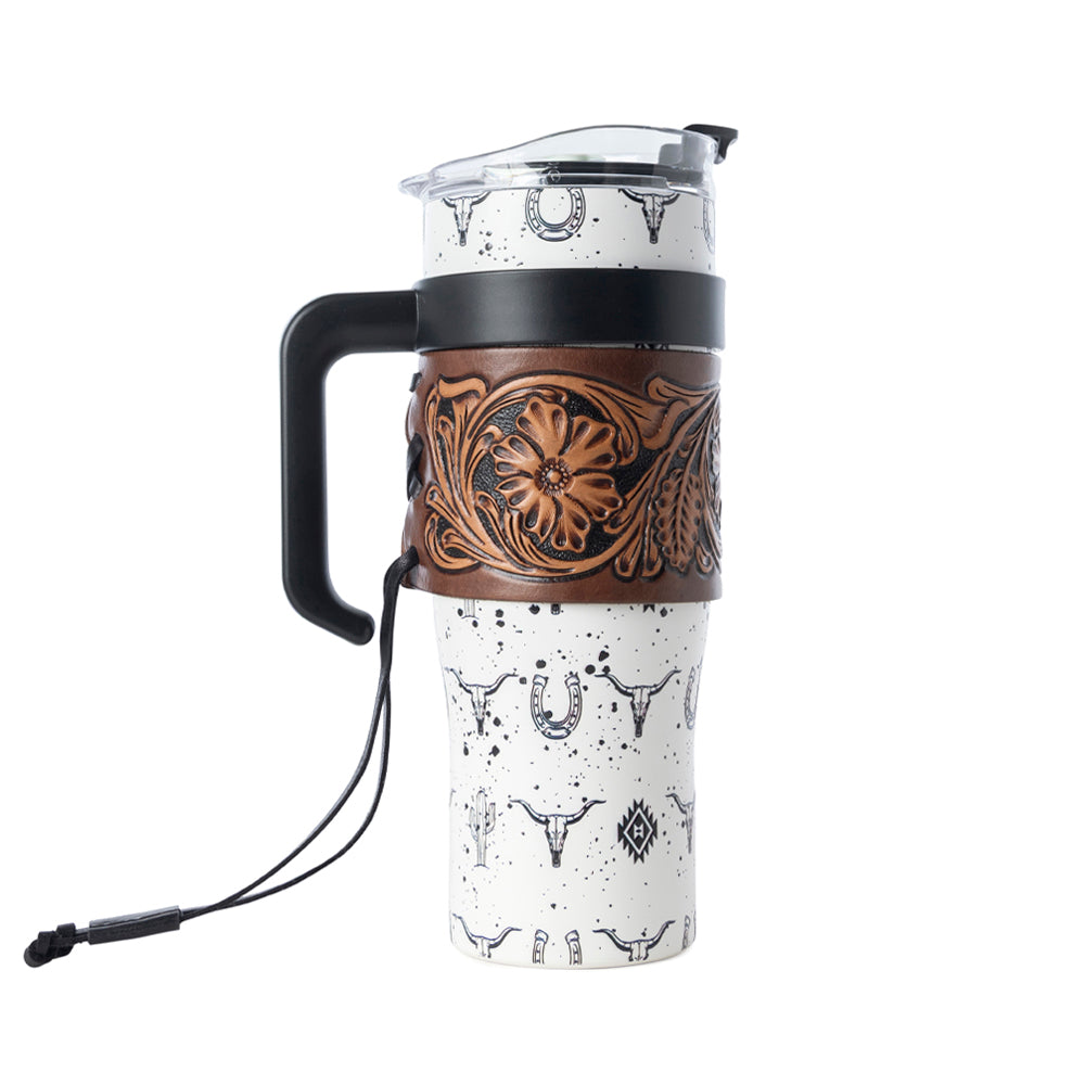 Myra USA Westmark Tooled Western Tumbler in white stainless steel with leather wrap and handle, featuring intricate tooling design.