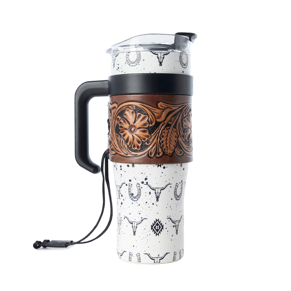 Myra USA Westmark Tooled Western Tumbler in white stainless steel with leather wrap and handle for outdoor use.