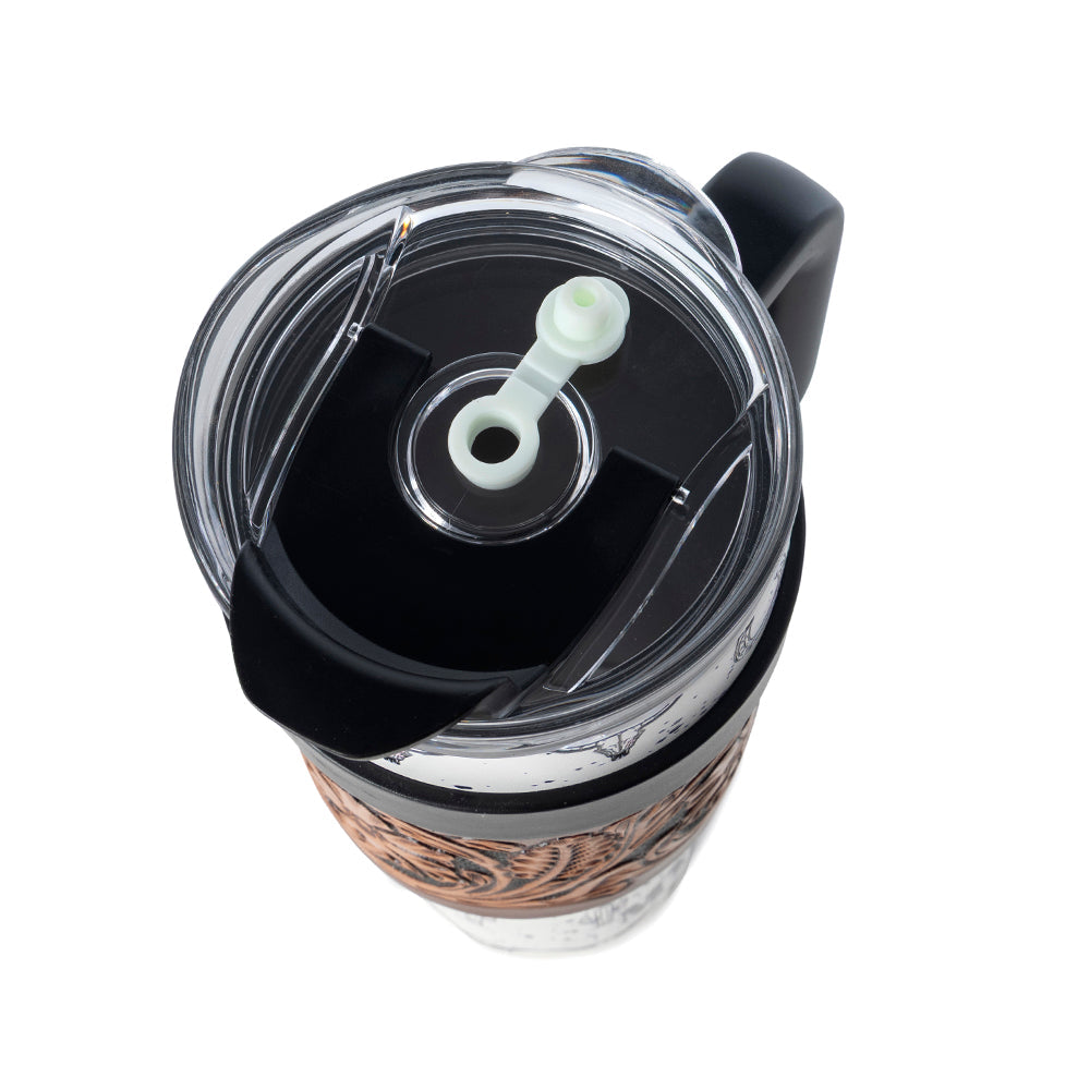 Myra USA Westmark Tooled Western Tumbler in white stainless steel with leather wrap and handle for stylish use.