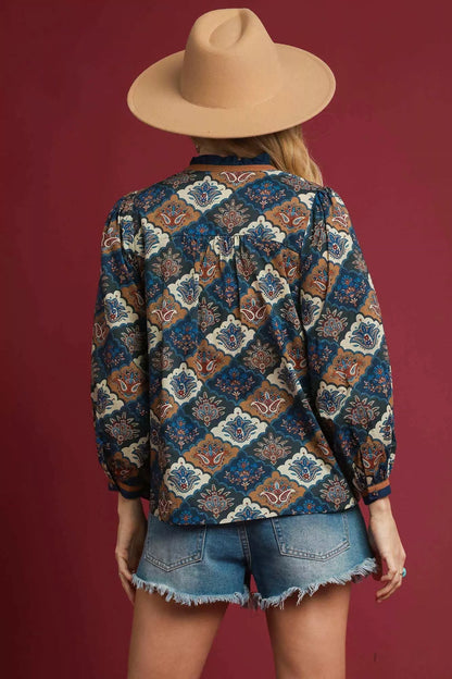 Navy mix abstract print ruffle neck top by Umgee, featuring a stylish ruffled neckline and relaxed fit, perfect for casual wear.