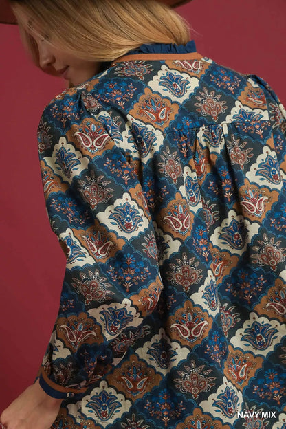 Navy mix Umgee abstract print ruffle neck top with long sleeves and ruffle details, stylish women's fashion blouse.