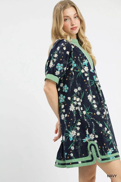 Navy Umgee floral puff sleeve dress with contrast trim, featuring a feminine silhouette and ruffled sleeves, by Trendsi.
