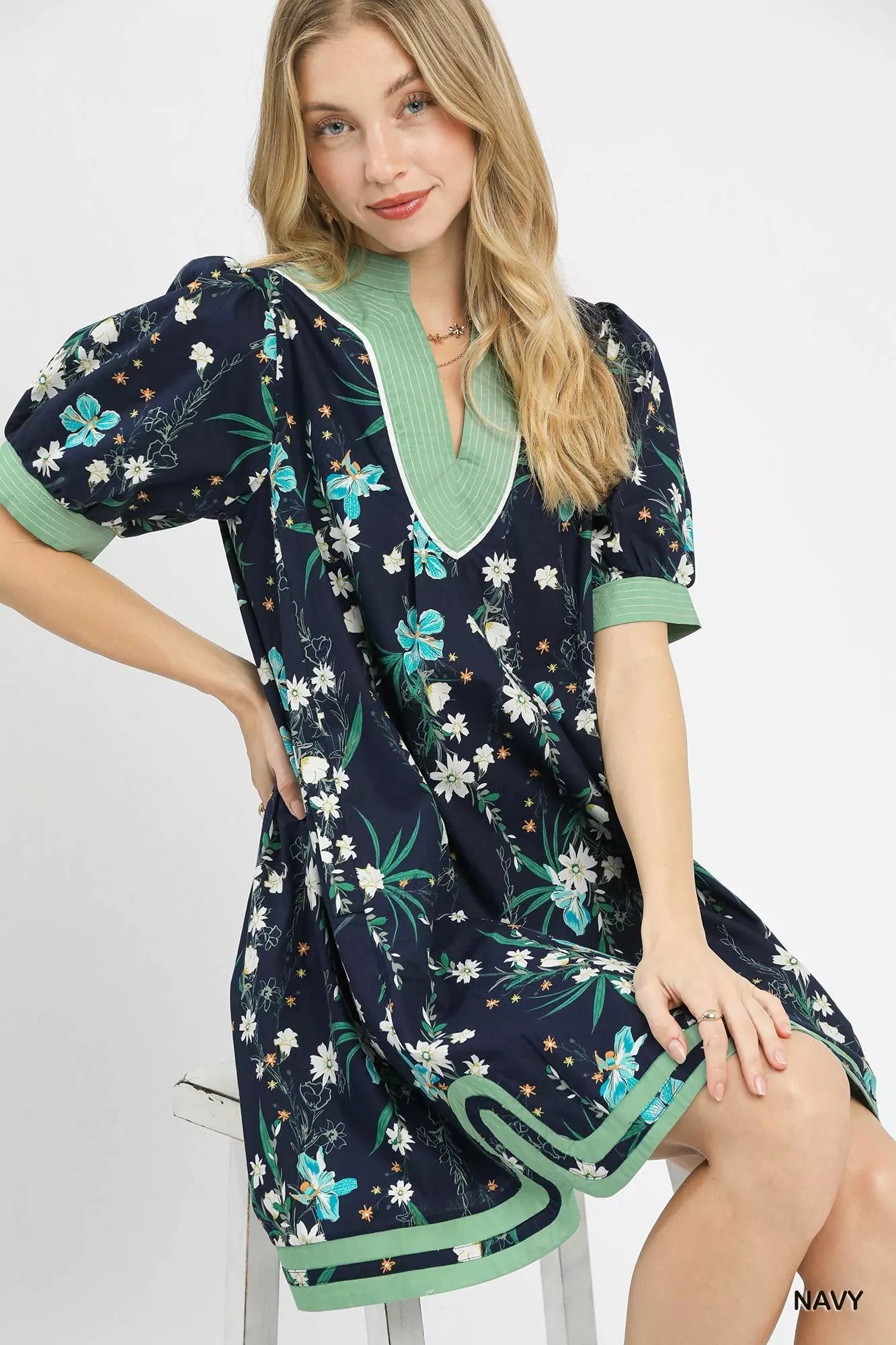 Navy floral puff sleeve dress with contrast trim by Umgee, featuring feminine design and stylish detailing.