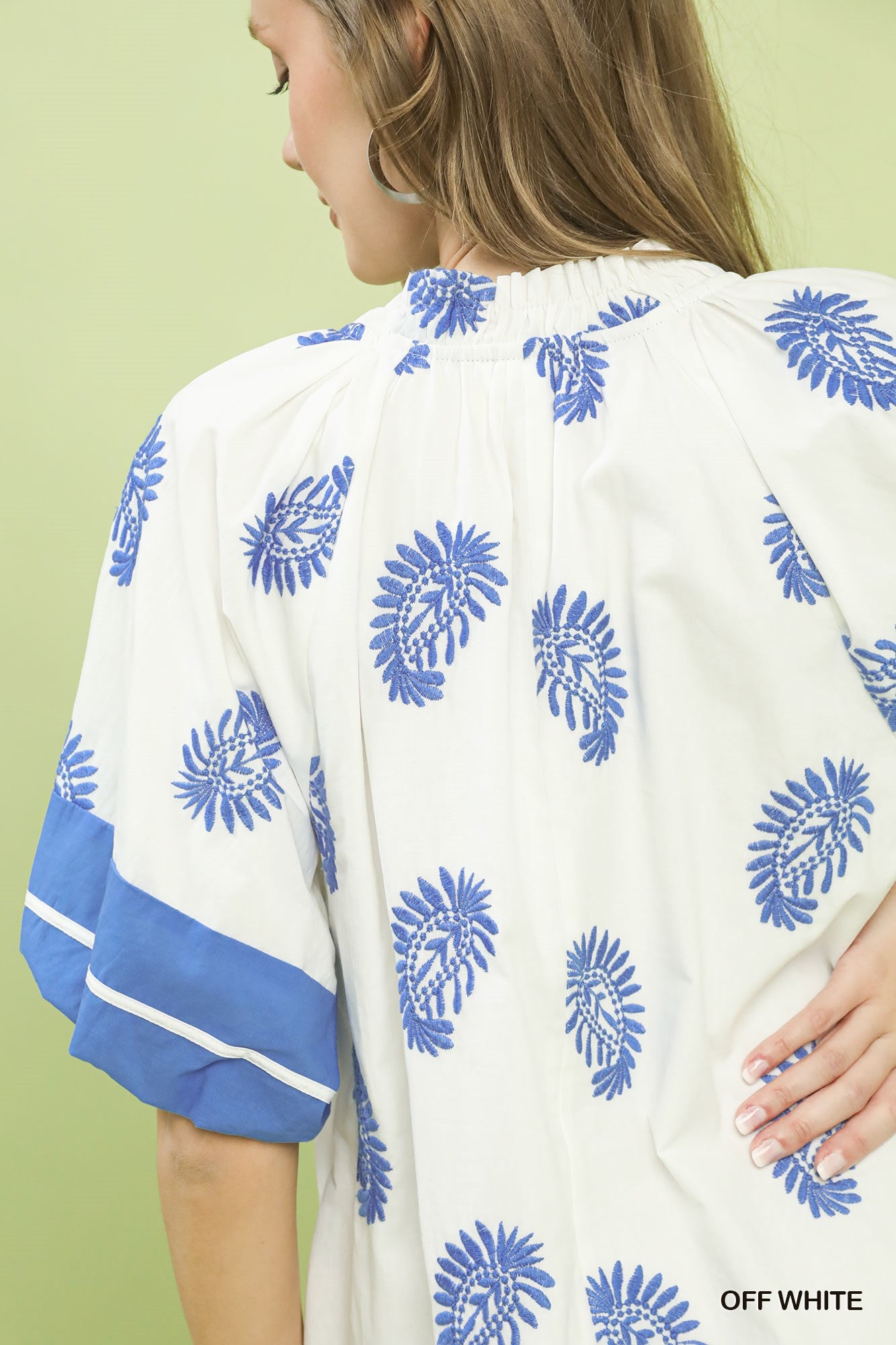 Off-white Umgee Paisley Embroidered Boho Mini Dress with intricate embroidery, short length, and relaxed fit.