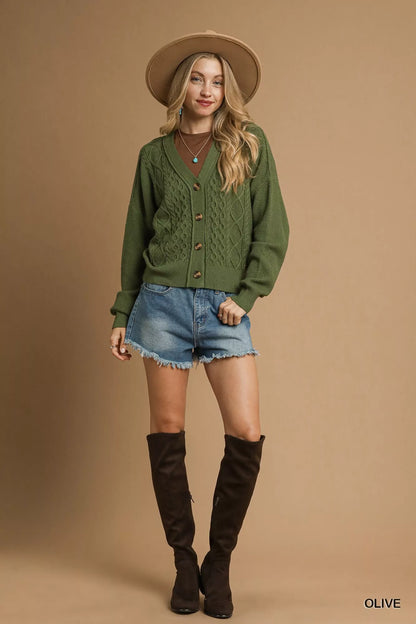 Olive green Umgee chunky cable knit V-neck button-up cardigan with long sleeves and front buttons, casual and cozy style.