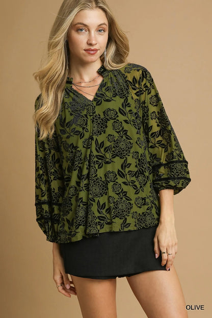Olive green plus size floral velvet blouse with balloon sleeves from Umgee, styled by Trendsi.