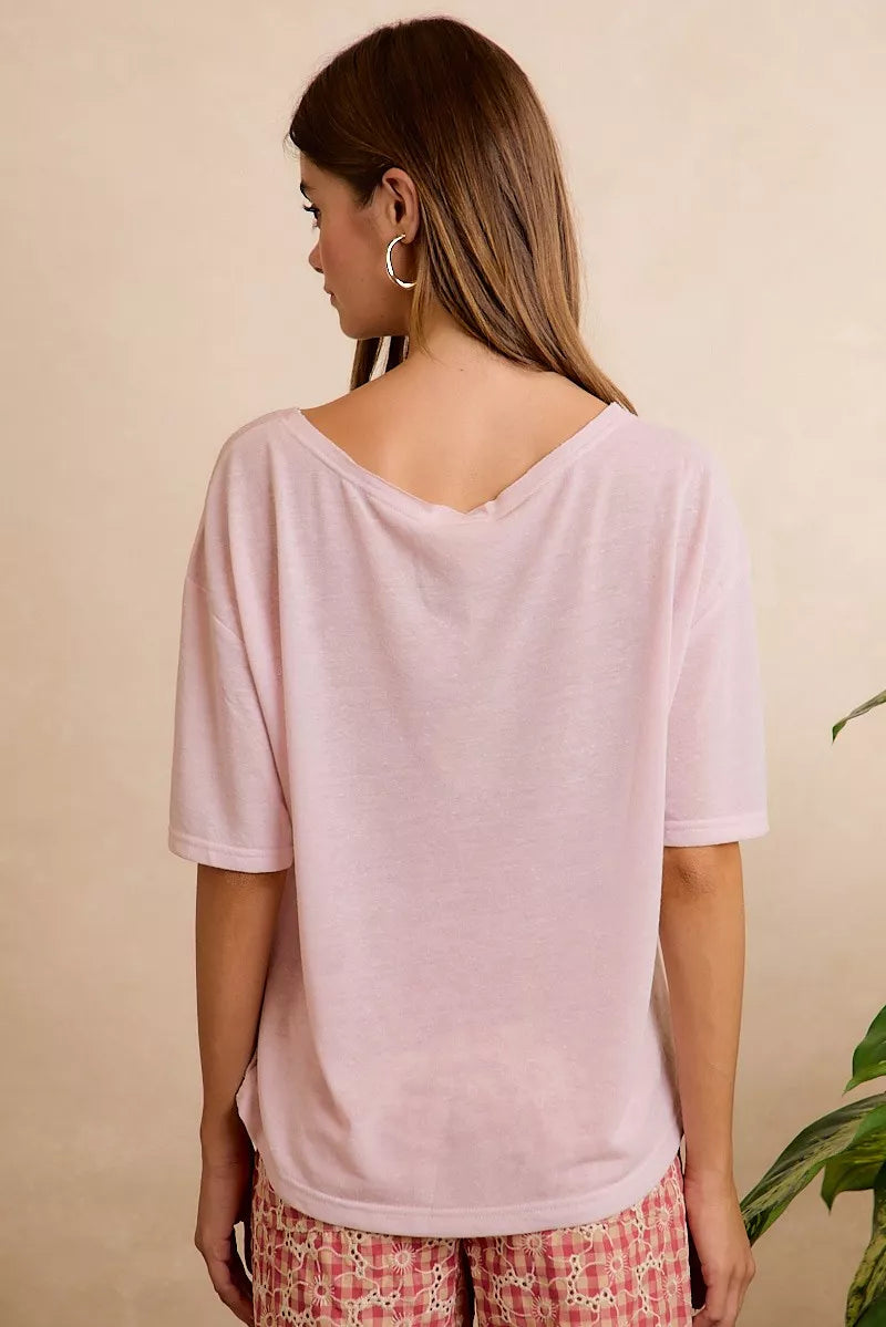 Pale lavender BiBi solid jersey relaxed fit short sleeve pocket top by Trendsi, casual and comfortable for everyday wear.