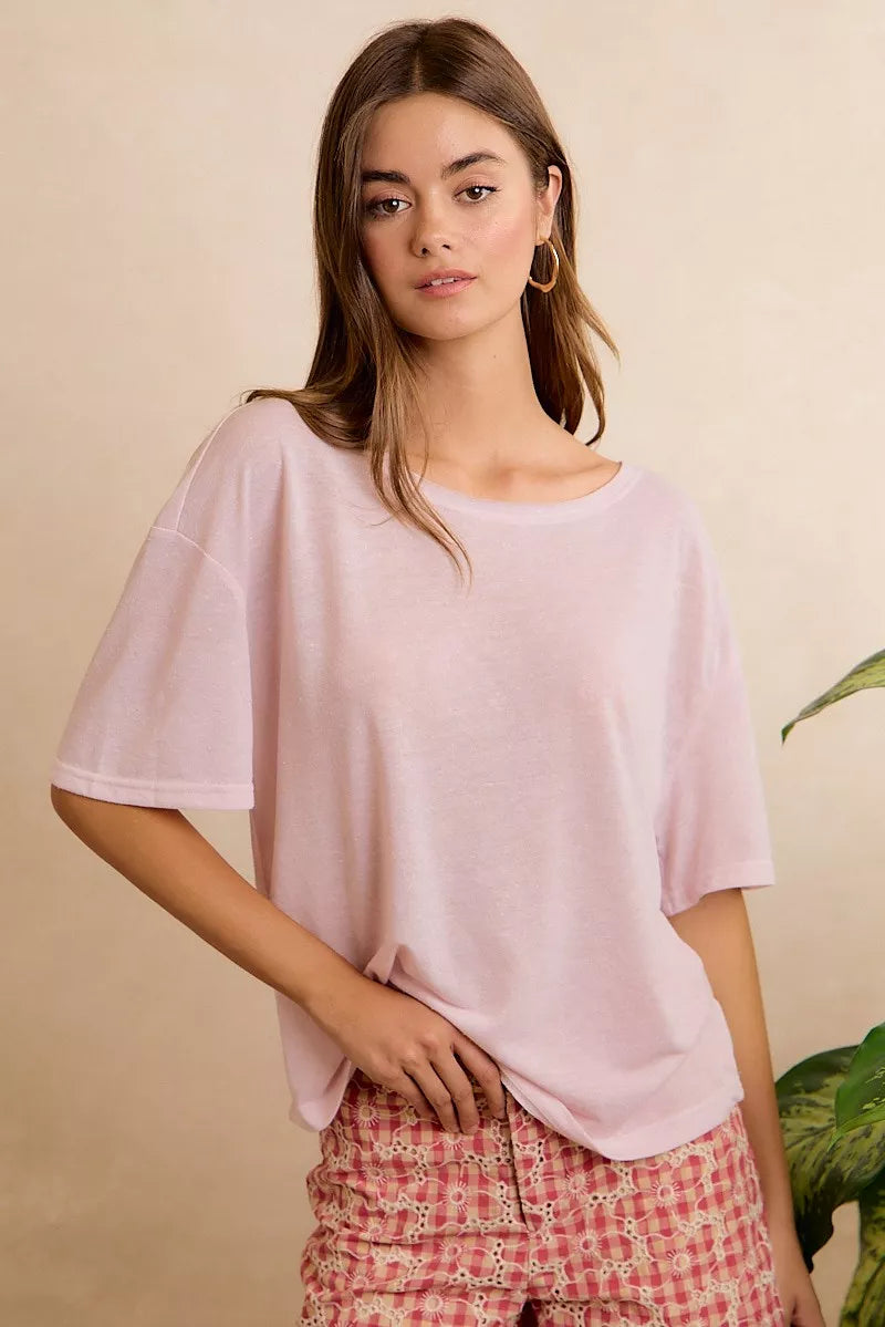 Pale lavender BiBi solid jersey relaxed fit short sleeve pocket top by Trendsi, casual and comfortable for everyday wear