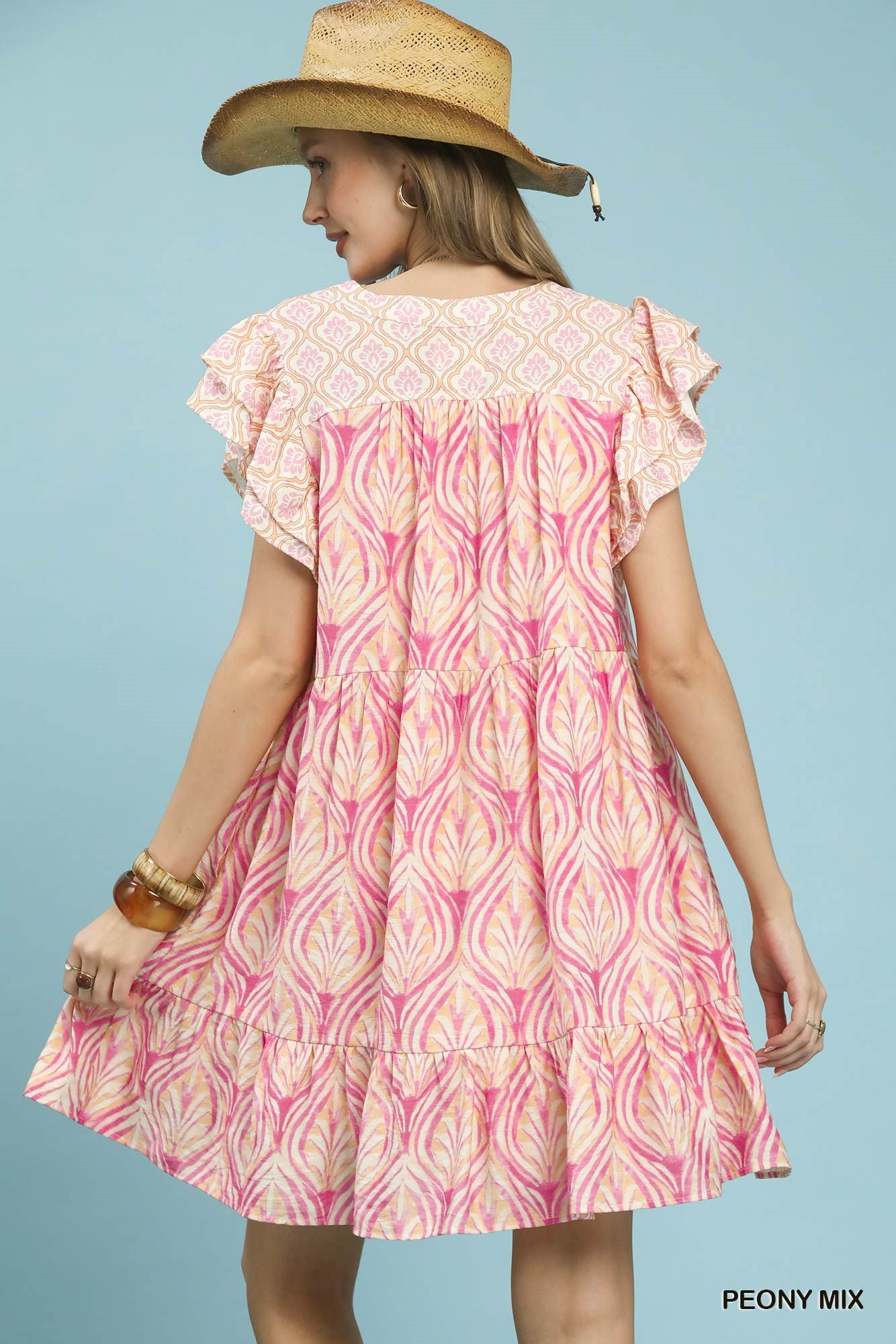Umgee Mix Printed Flutter Sleeve Dress with peony floral pattern and flowy fabric, ideal for casual or summer wear.