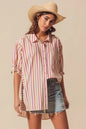 Pink multicolored stripe button-down shirt from SO ME by Trendsi, featuring a classic collar and long sleeves.