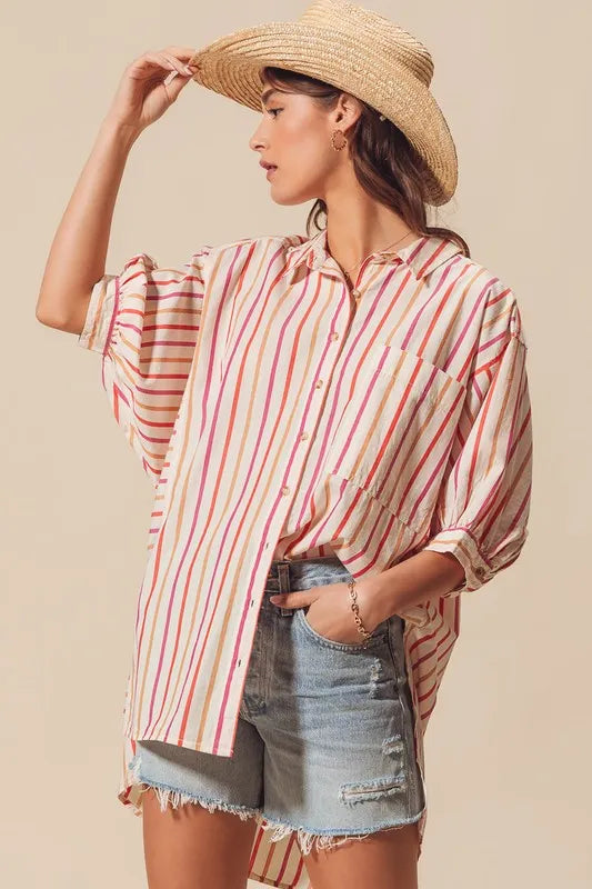 Multicolored stripe button-down shirt in pink tones from SO ME by Trendsi, shown on a model.