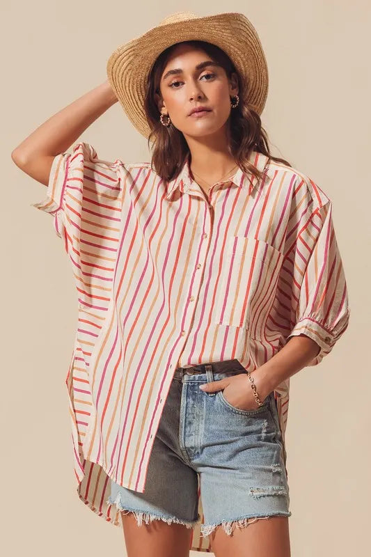 Pink and multicolored striped button-down shirt from SO ME by Trendsi, featuring a classic collar and long sleeves.