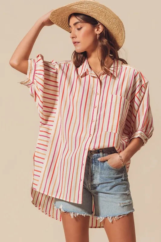 Pink and multicolored striped button-down shirt from SO ME by Trendsi, featuring a classic collar and long sleeves.