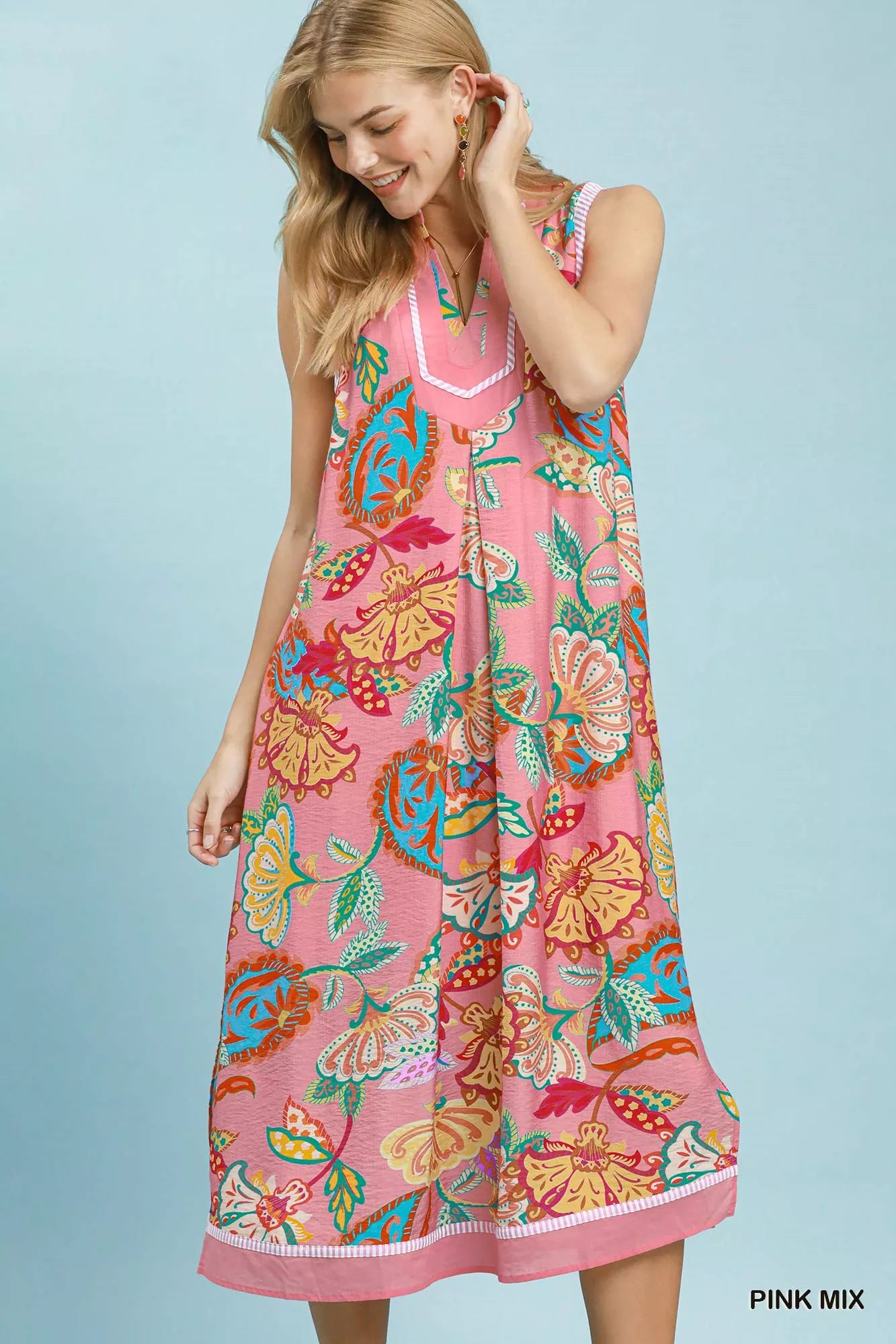 Pink mix Umgee paisley floral sleeveless midi dress with a flowy silhouette and V-neck, perfect for casual or dressy occasions.
