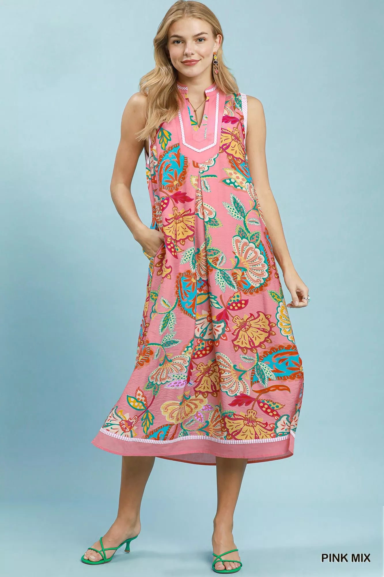 Pink paisley floral sleeveless midi dress by Umgee, featuring a flowy silhouette and vibrant pattern.