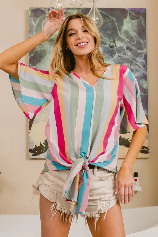 Pink multi-stripe woven V-neck top with long front tie from Trendsi, featuring a stylish and comfortable design.