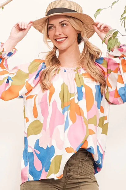 Pink and multi-color Lime 'N' Chili abstract print off-the-shoulder long sleeve top by Trendsi, showcasing vibrant pattern and stylish design.