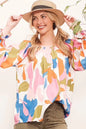 Pink and multi-color Lime 'N' Chili abstract print off-the-shoulder long sleeve top by Trendsi, showcasing vibrant pattern and stylish design.
