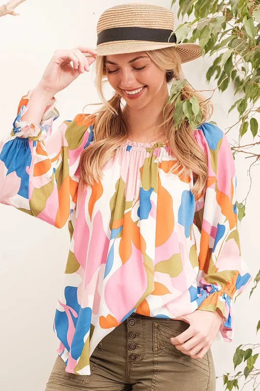 Pink and multi-color Lime 'N' Chili abstract print off-the-shoulder long sleeve top by Trendsi, featuring a stylish and colorful design.