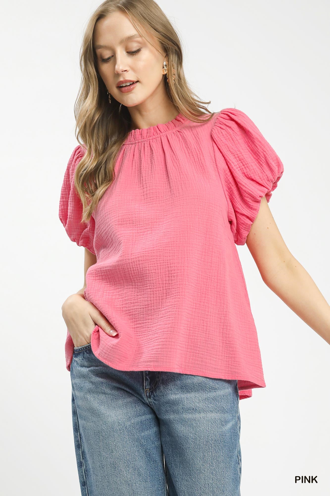 Pink Umgee textured gauze boho top with ruffle neckline, featuring a relaxed fit and stylish, casual design.