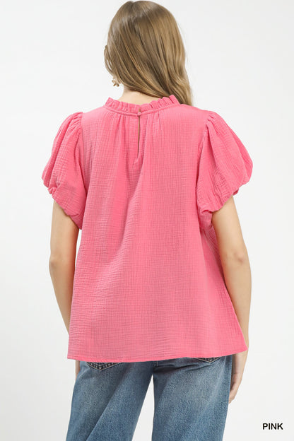 Pink Umgee textured gauze boho top with ruffle neckline, featuring a relaxed fit and casual, trendy style.