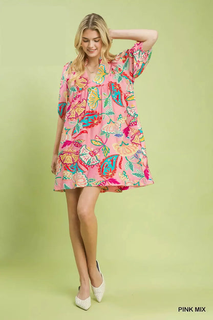 Pink and white paisley print mini dress by Umgee, featuring a stylish and lightweight design perfect for casual or summer wear.