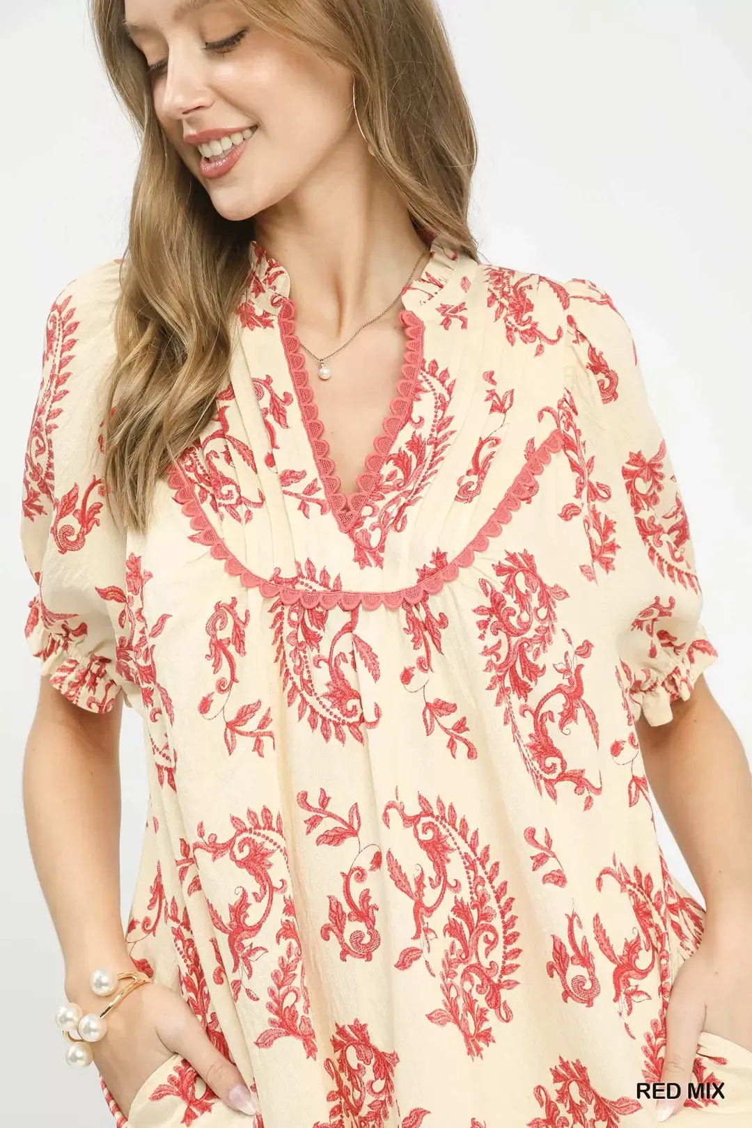 Red Umgee Mix Paisley Scallop Trim Dress with flowing fabric, intricate paisley pattern, and scalloped hem detail.