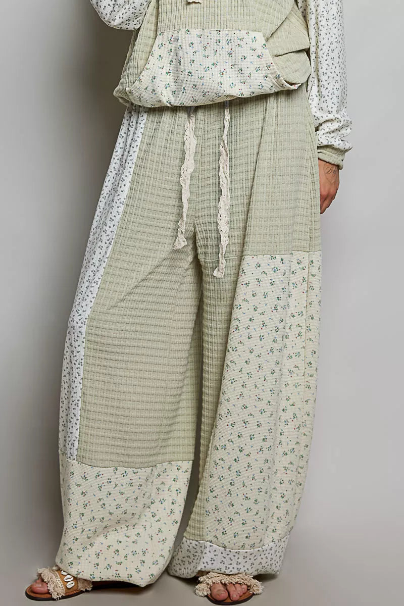 Sage multi-colored patchwork knit wide-leg pants by Trendsi, featuring a relaxed fit and diverse mixed knit pattern.