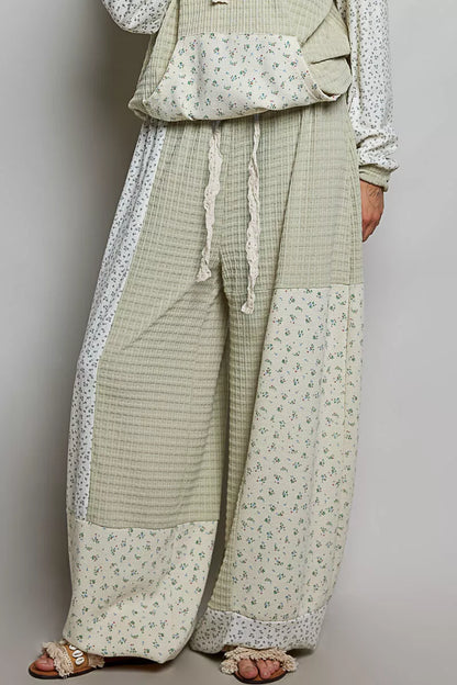 Sage multi-colored patchwork knit wide-leg pants by Trendsi, featuring a relaxed fit and diverse mixed knit pattern.