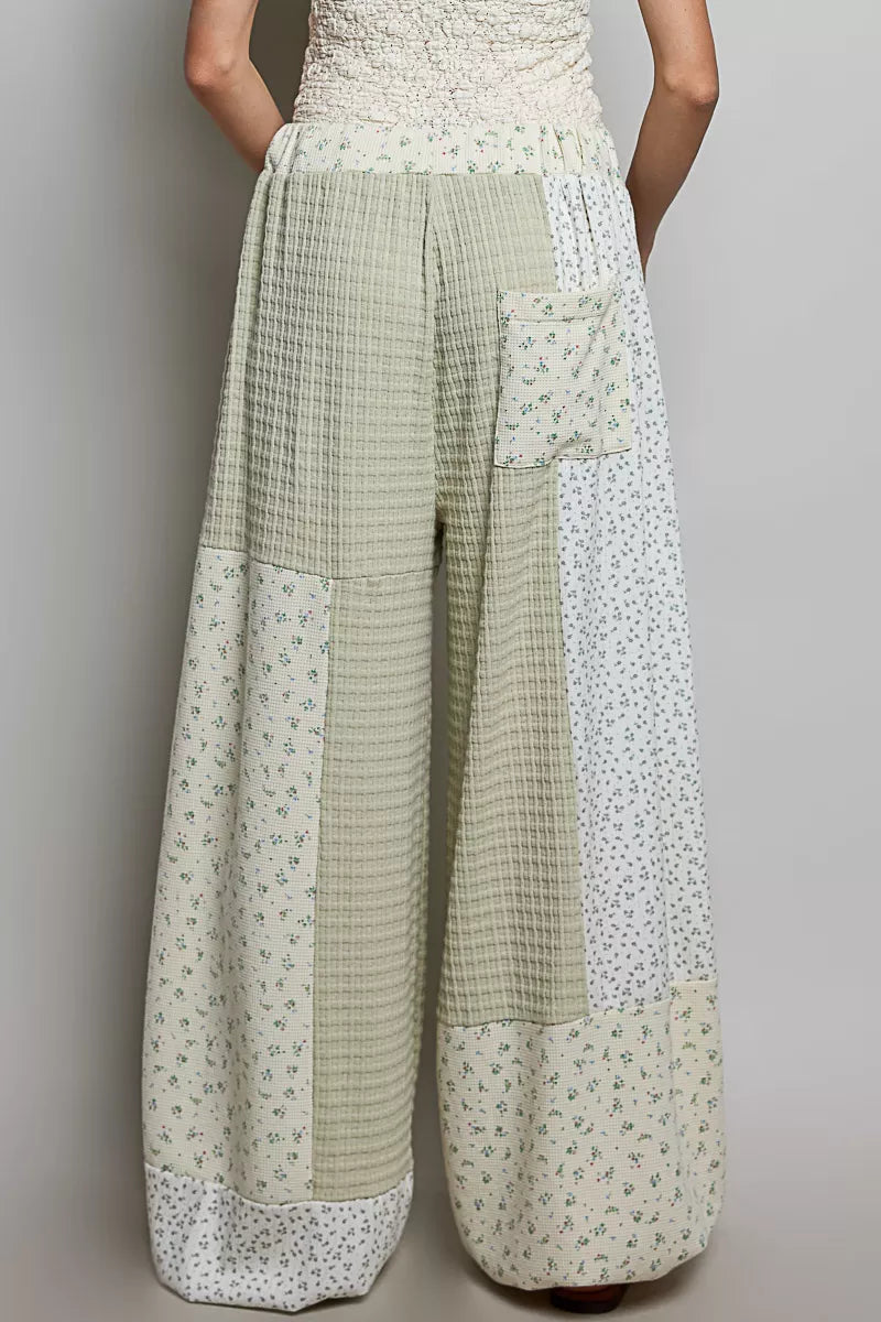 Sage multi-color patchwork knit wide-leg pants from Trendsi featuring a relaxed fit and mixed knit design.