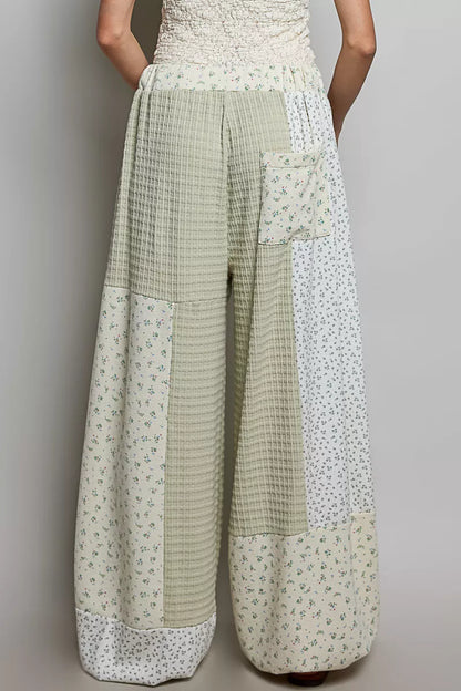 Sage multi-color patchwork knit wide-leg pants from Trendsi featuring a relaxed fit and mixed knit design.