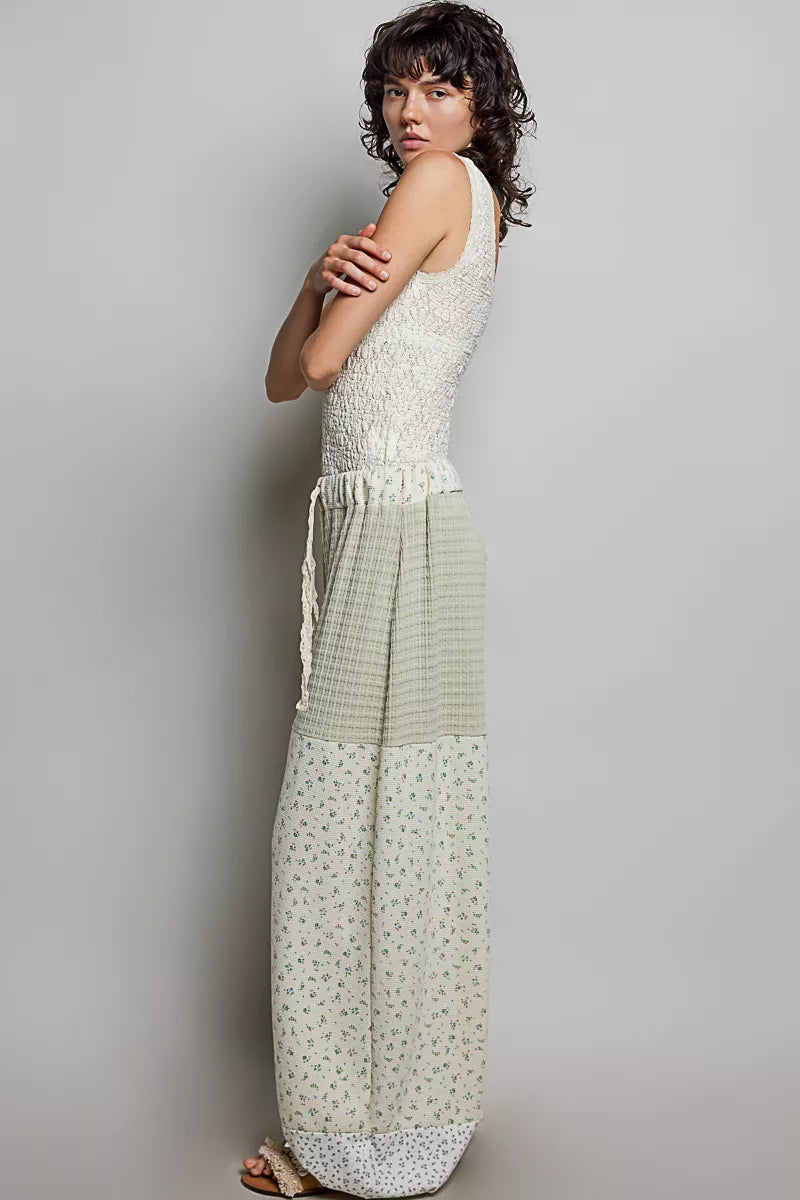 Sage and multi-colored patchwork knit wide-leg pants from Trendsi, featuring a relaxed fit and stylish mixed knit design.