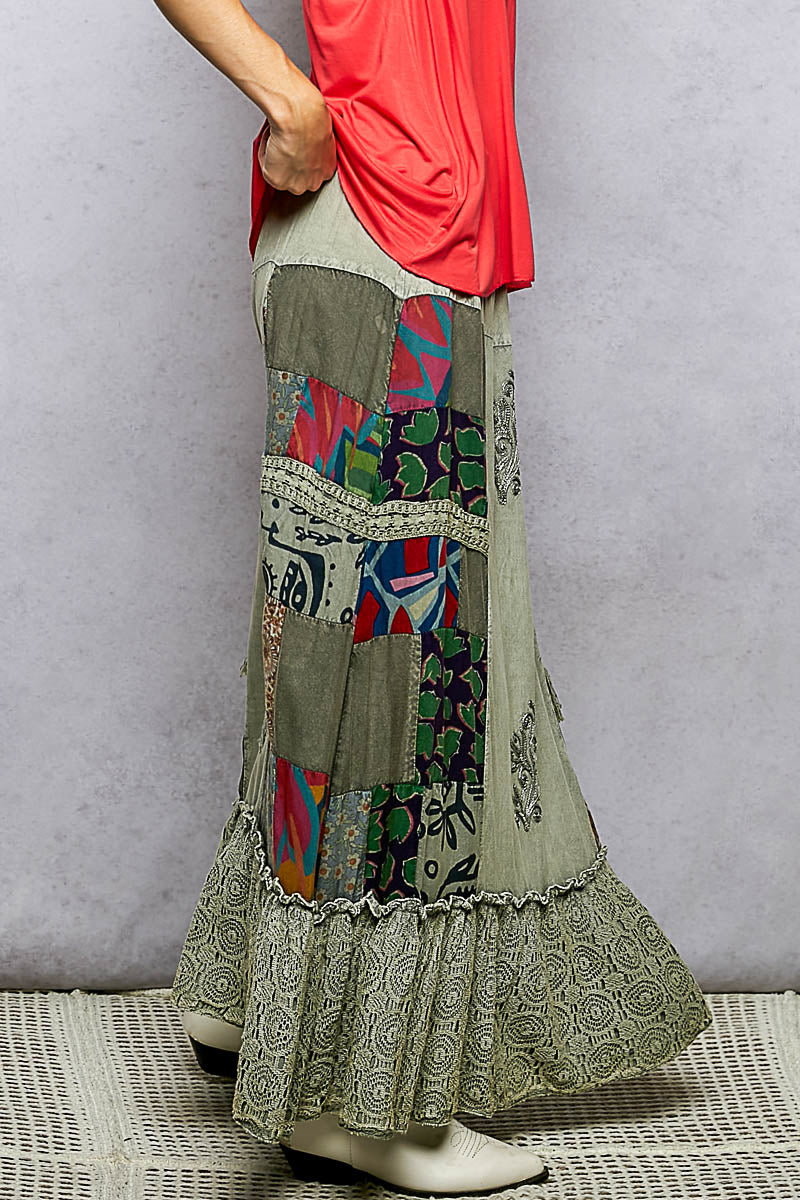 Sage multi-colored printed patchwork embroidered ruffled skirt by Trendsi, showcasing intricate embroidery and layered ruffle details.