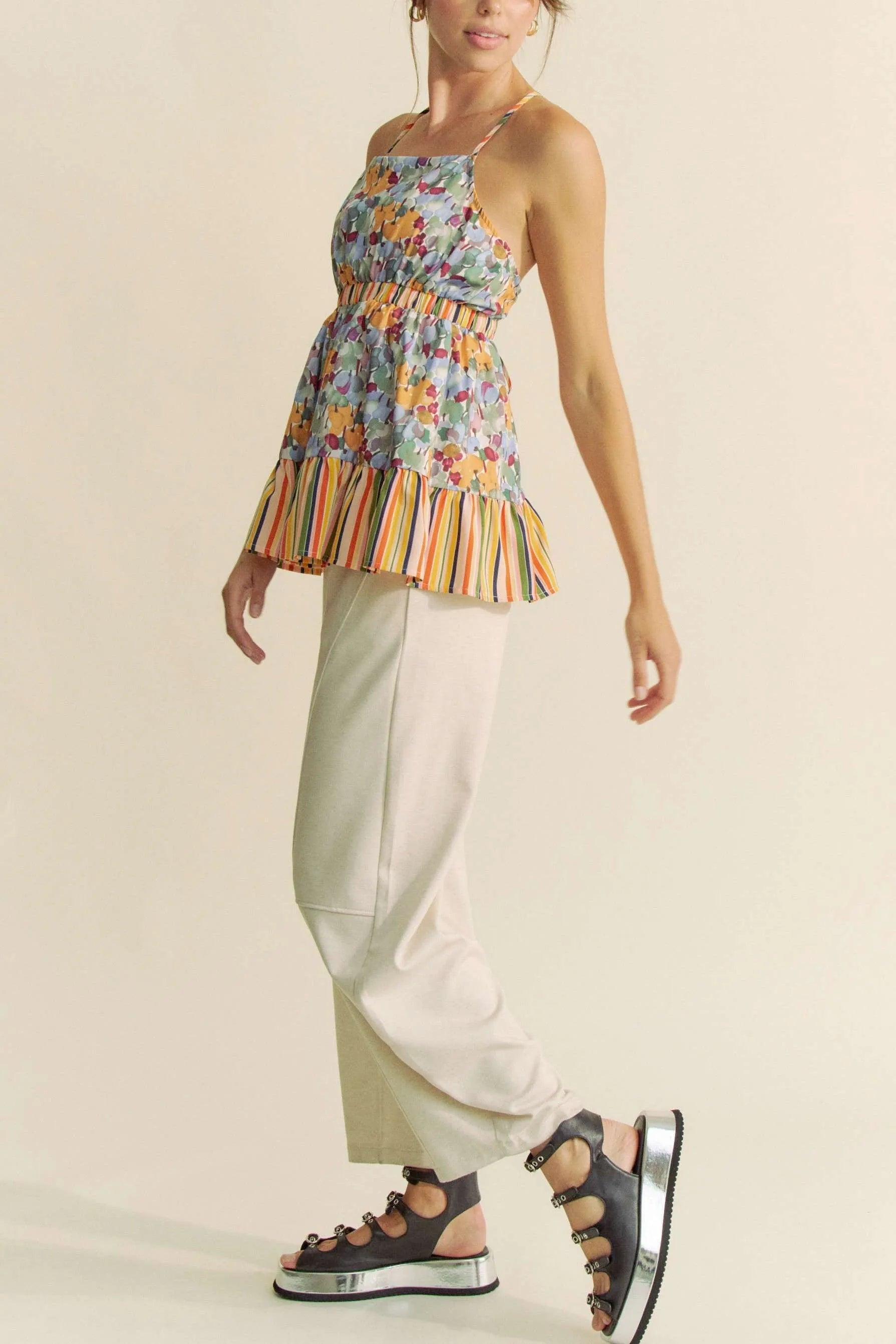 Sage Davi & Dani floral smocked sleeveless ruffle back tie top, stylish summer blouse with floral print and ruffle details.