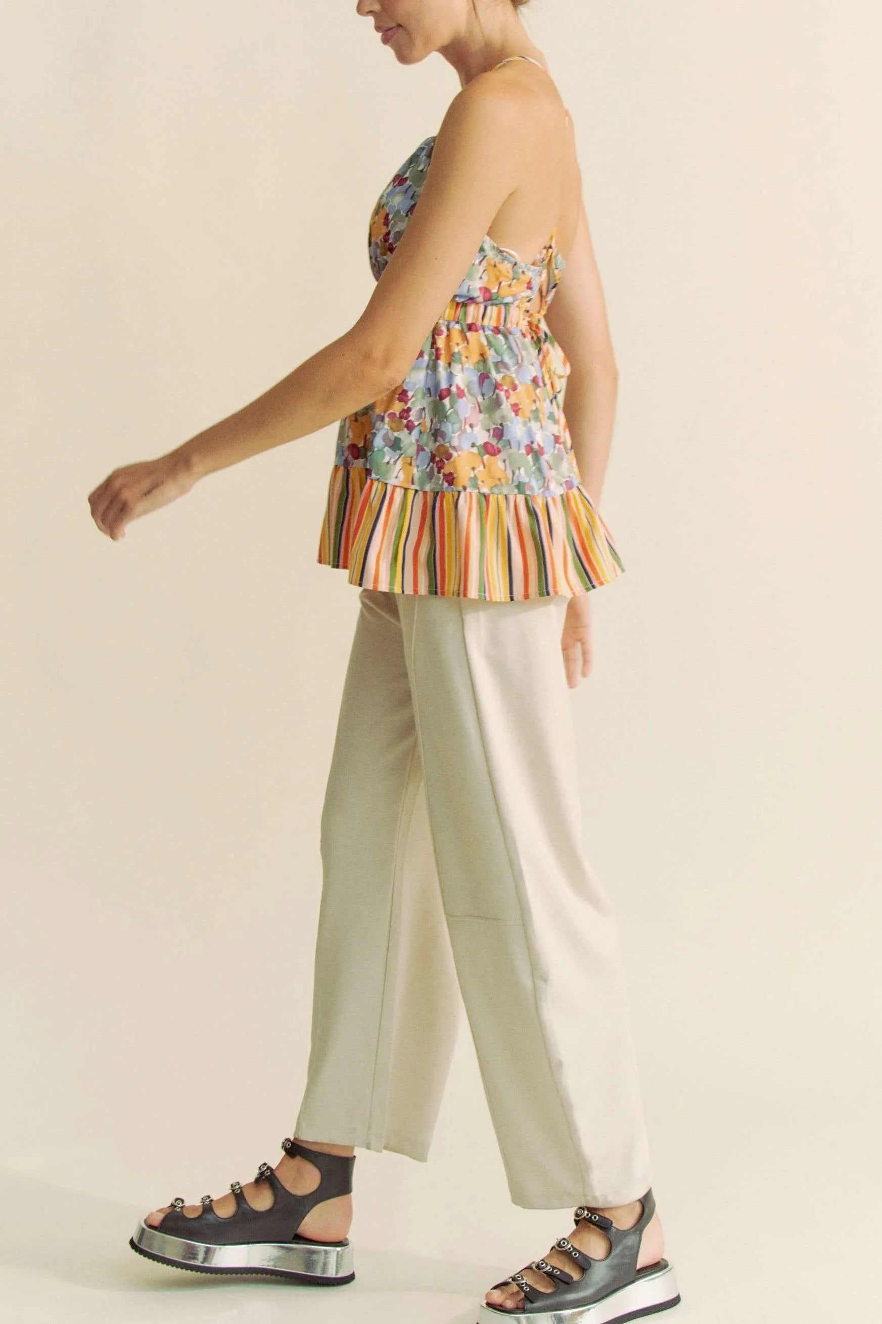 Sage floral smocked sleeveless top by Davi & Dani with ruffle details and back tie, perfect for warm weather fashion.
