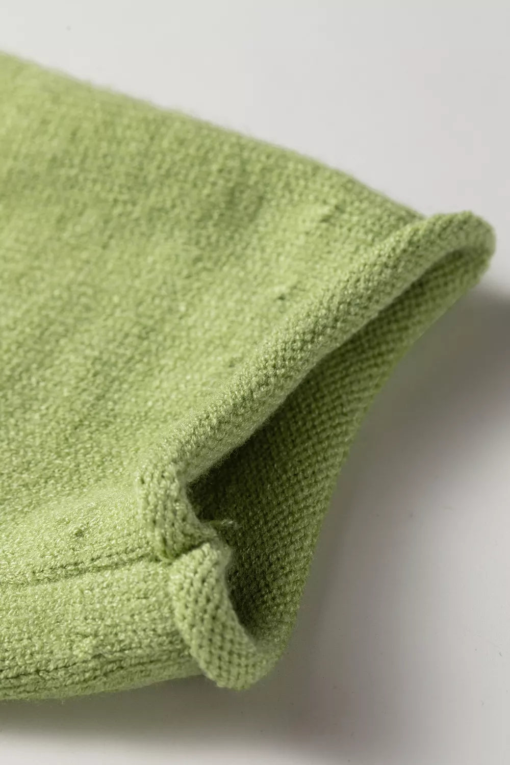 Sage green fish graphic round neck sweater from Trendsi featuring a casual, comfortable knit design with a marine-inspired print.