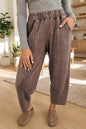Taupe mineral wash barrel pants with seam details and elastic waistband, stylish and comfortable women's fashion by Trendsi.