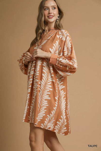 Taupe Umgee leaf print notched mini babydoll dress with flowy silhouette and short sleeves, perfect for casual wear.