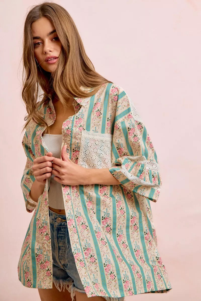 Teal BiBi eyelet lace and floral mix and match shirt top from Trendsi, featuring eyelet details and floral accents.