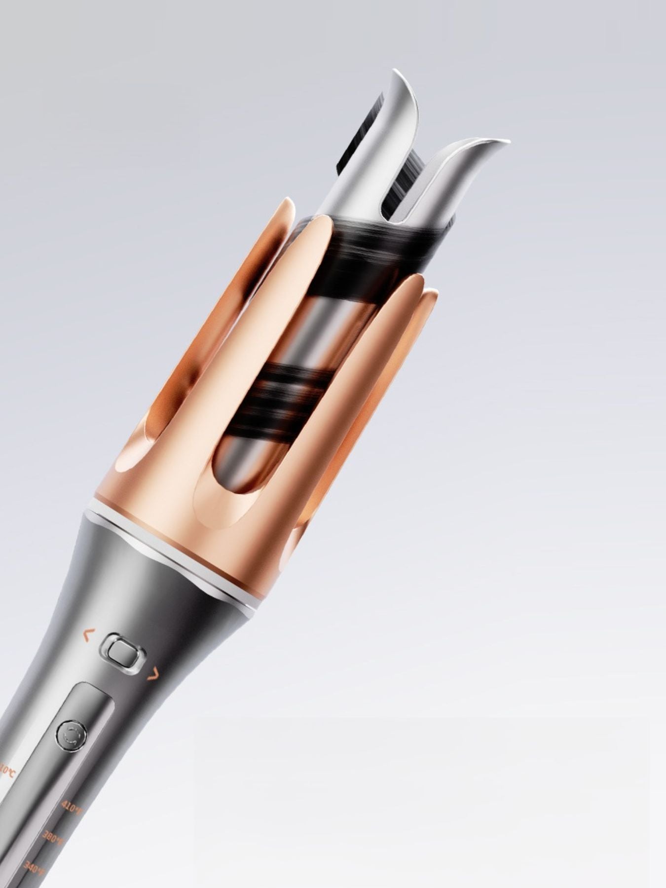 Automatic rotating ceramic hair curling iron by Trendsi with 25mm barrel and European plug, designed for easy, even curls.