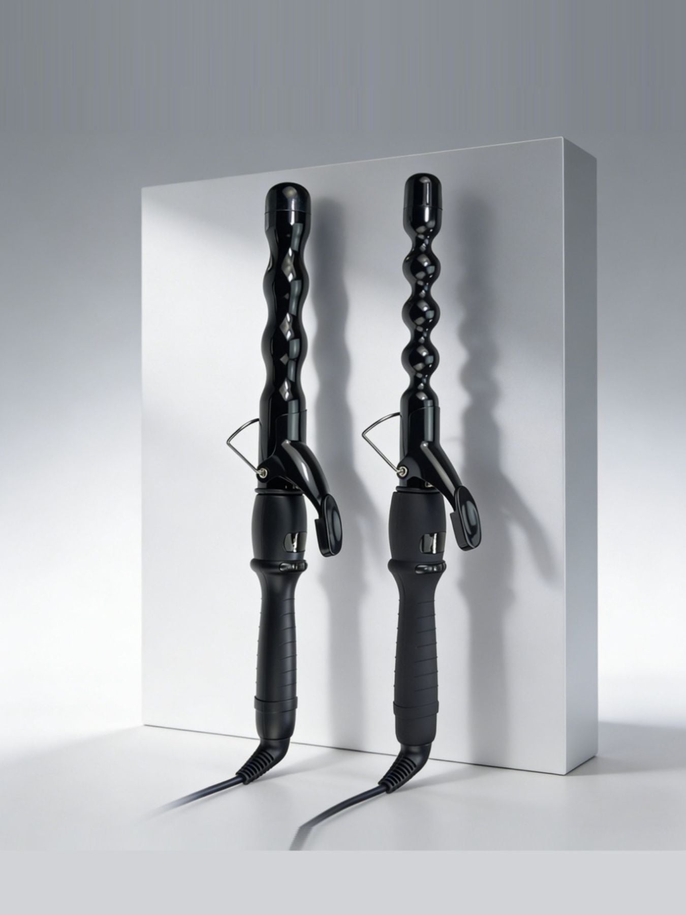 Trendsi 25mm adjustable temperature curling iron with North American plug, featuring a sleek design and ergonomic handle for styling.