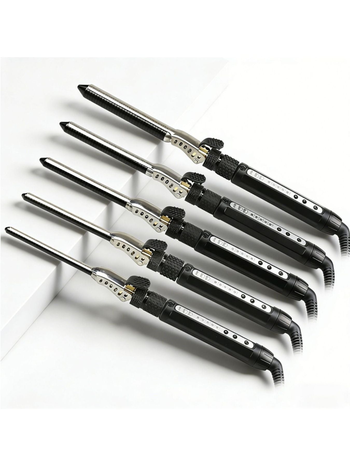 Trendsi 7mm adjustable temperature curling iron with European plug, featuring a sleek design for versatile hair styling.