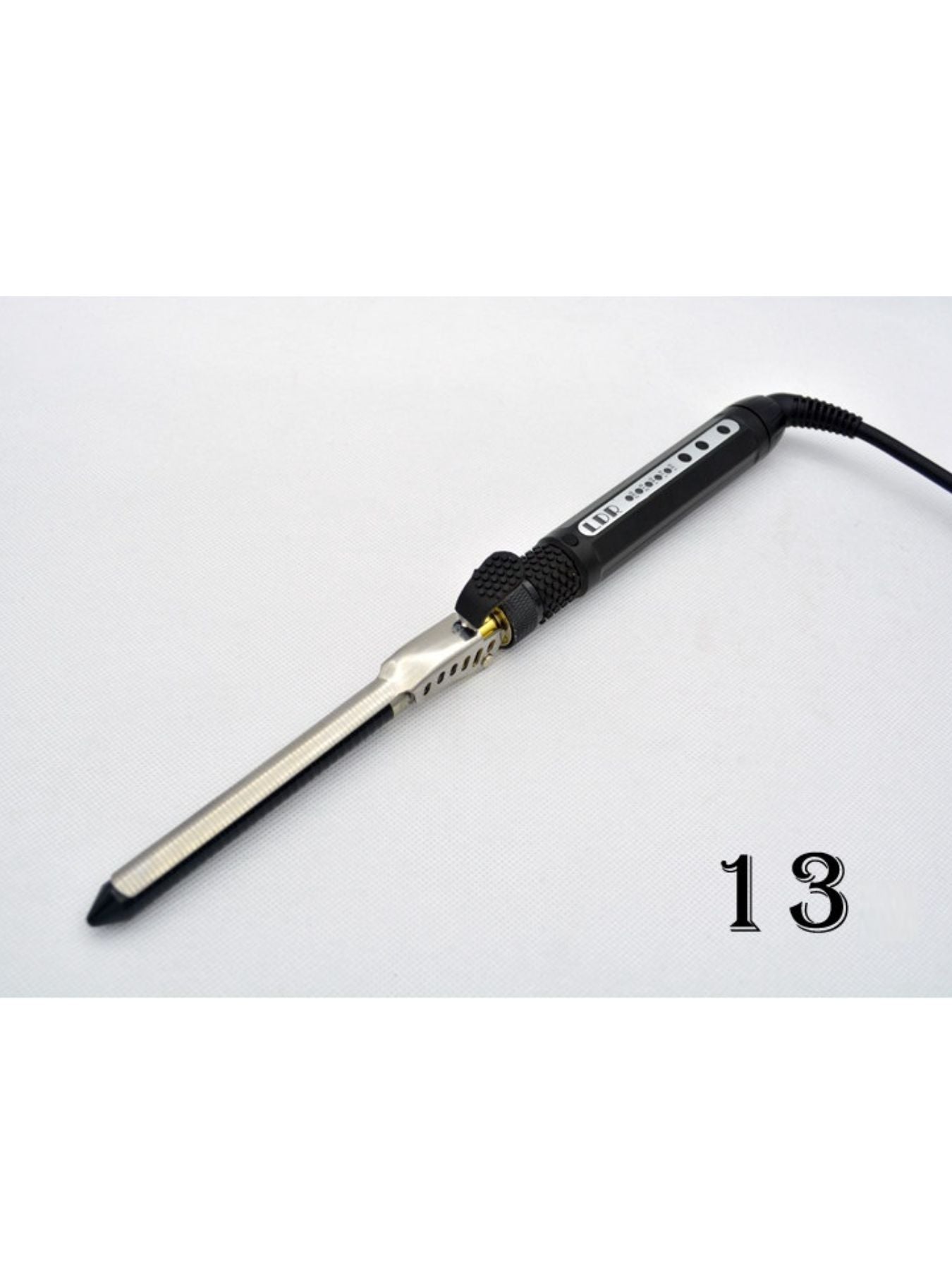 Trendsi adjustable temperature curling iron with 7mm barrel for versatile styling, European plug, and ergonomic design.