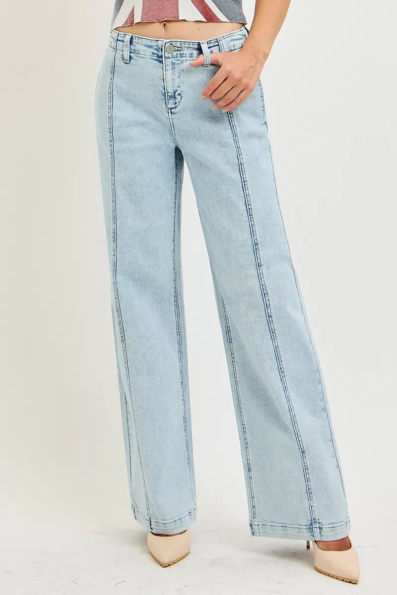 Light acid-wash RISEN slouchy wide-leg jeans from Trendsi, showcasing relaxed fit and casual style with visible distressed details.