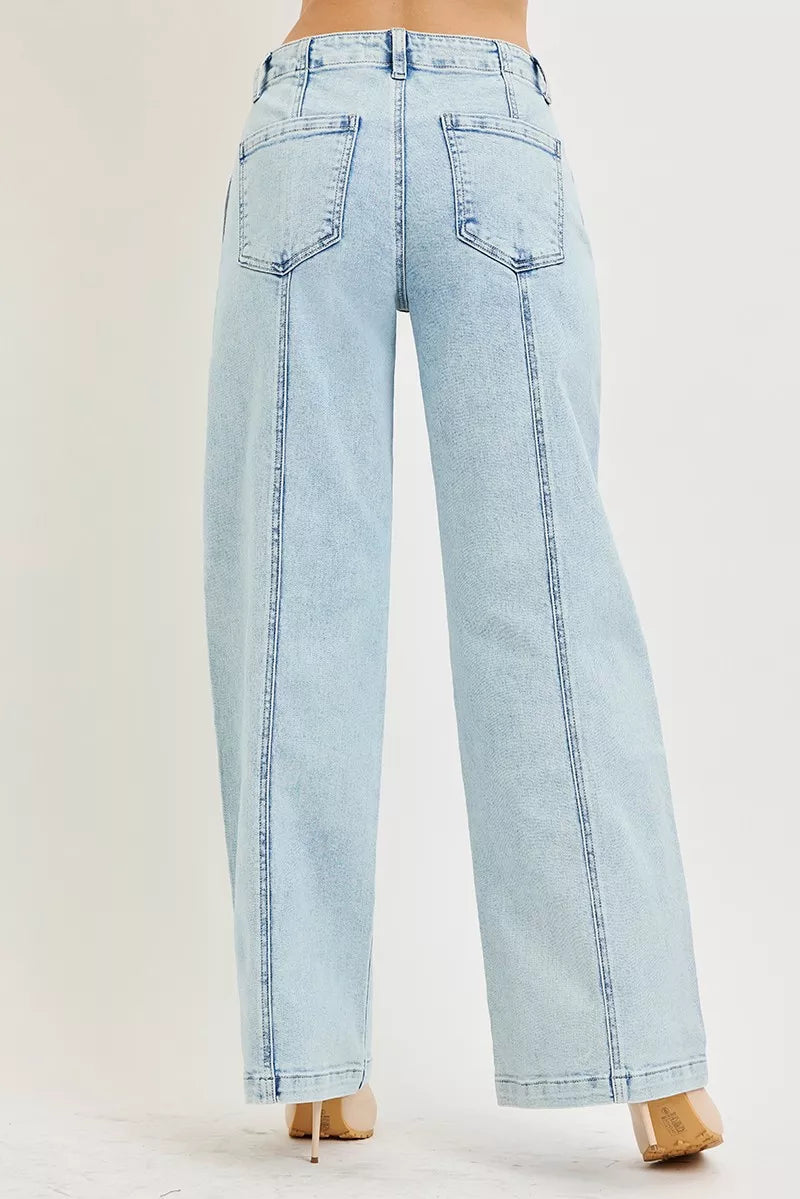 Light acid-wash RISEN slouchy wide-leg jeans from Trendsi featuring relaxed fit, high waist, and casual denim style.
