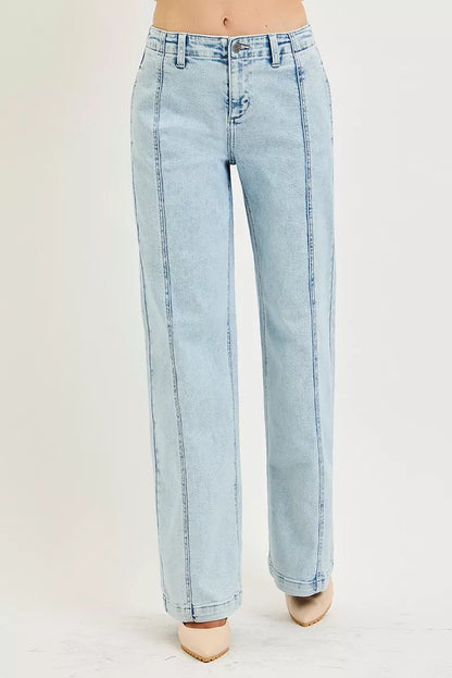 Light acid-wash RISEN slouchy wide-leg jeans from Trendsi, showing relaxed fit and stylish distressed details.